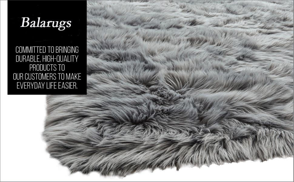 Large faux sheepskin rug adding warmth to living room decor